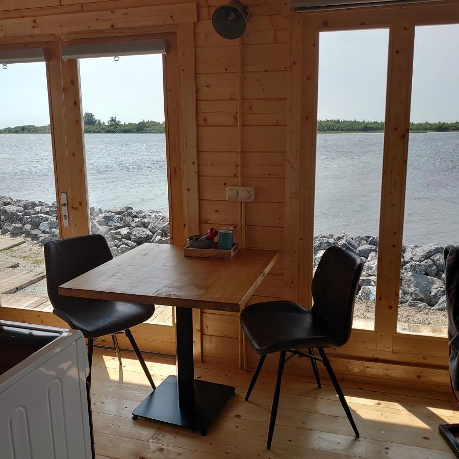 Waterhuisjes Op De Pier Van Lauwersmeerplezier! Lauwersoog Esterno foto
